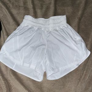 White lululemon size 4 shorts. Worn once in perfect condition